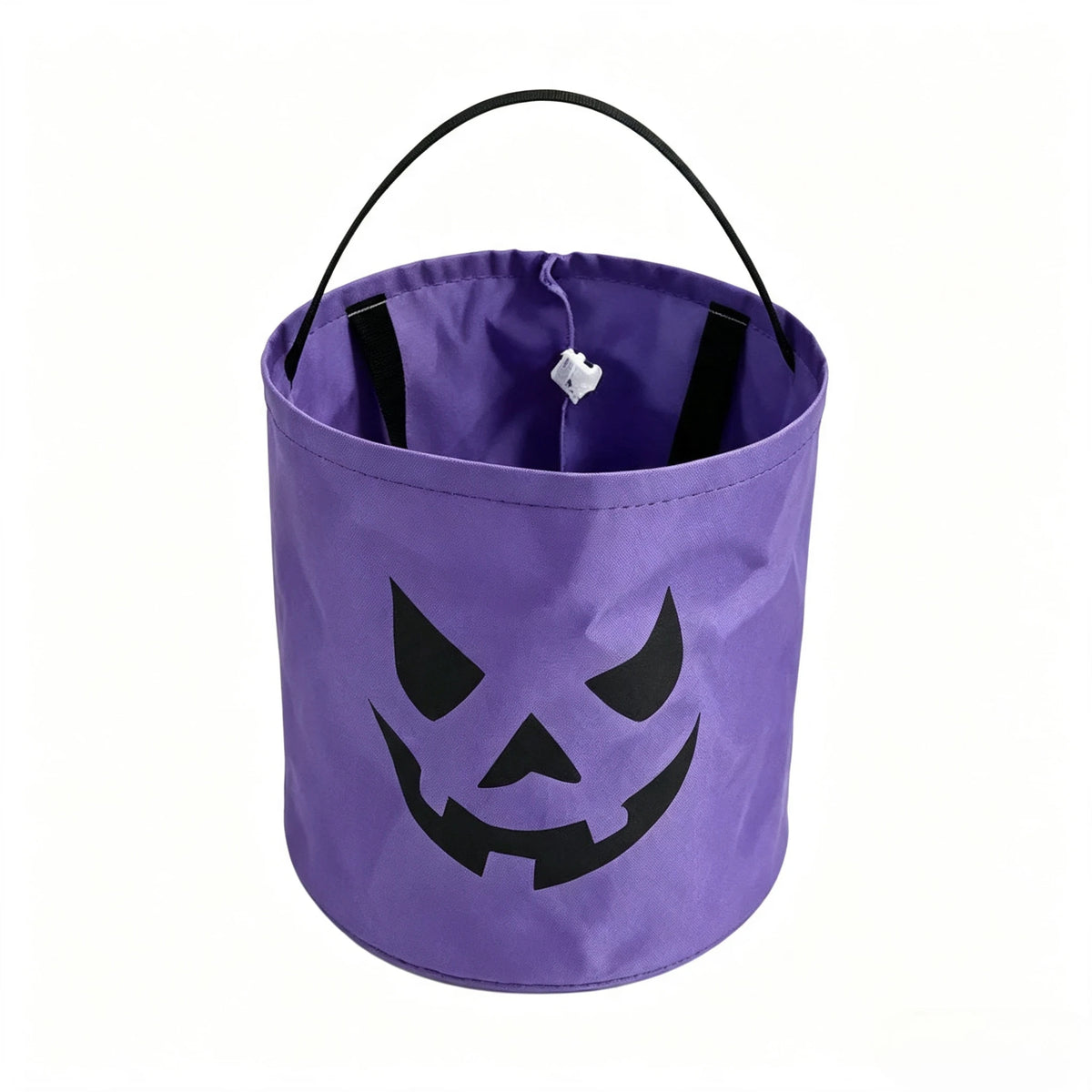 Purple fabric trick-or-treat bag with a black carved pumpkin face design