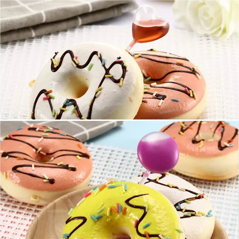 Eine Sammlung farbenfroher und dekorierter Donuts, darunter glasierte, gefrorene und gesprenkelte Sorten.