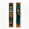 A vertical banner featuring a Mexican skull and floral motifs in shades of teal, gold, and orange.