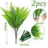 Two artificial Boston fern bushes with green leaves and fixed stems shown in various views.