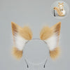 A set of faux fur fox tail and ear costume pieces in shades of tan and white.