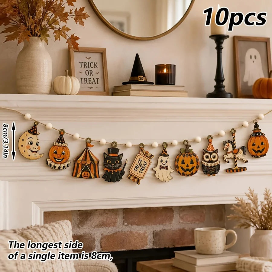 A string of vintage wooden Halloween decorations featuring pumpkins, ghosts, and moons displayed on a fireplace mantel.