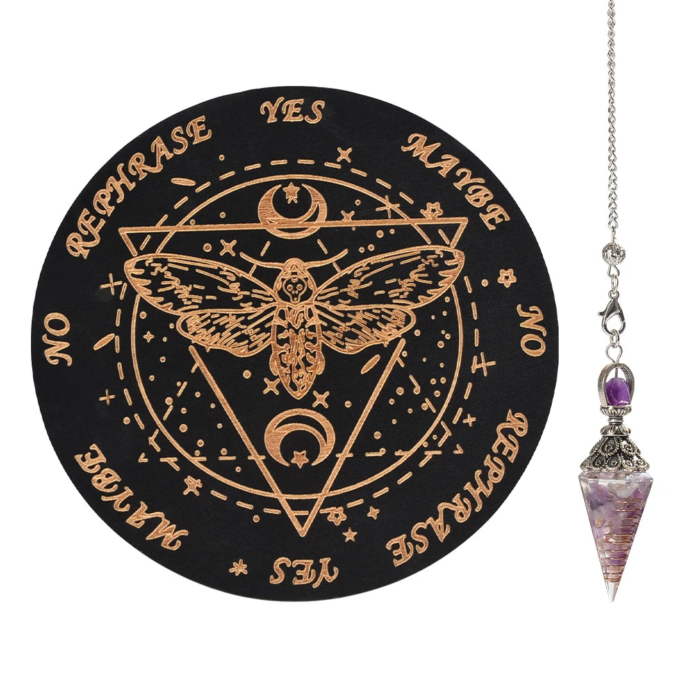 A black wooden pendulum board featuring a geometric design and text like YES, MAYBE, NO, REPHRASE, and a rose quartz crystal 
