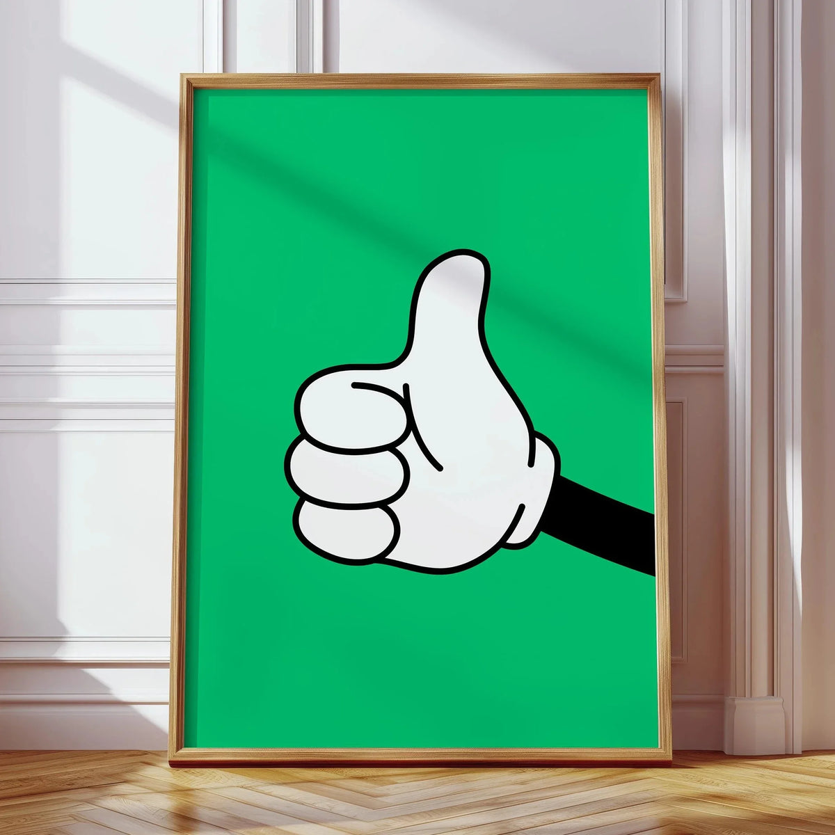 Una pieza de arte enmarcada con un gesto de la mano pintado en un lienzo verde brillante.
