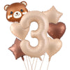 A set of foil balloons shaped like a cute bear and the number three in caramel and gold colors.