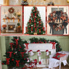 Velvet Christmas bows and ornaments decorating a festive holiday tree and wreath on a mantelpiece