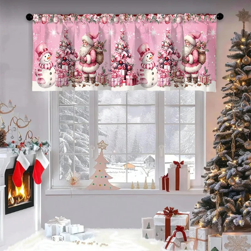 Pink festive Christmas valence curtains hanging in a window with a decorated Christmas tree and gifts