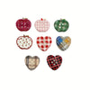 A set of eight heart-shaped checkered fridge magnets in various colors including pink, green, and multicolored patterns.