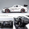 A white 1:32 scale diecast GTR sports car model with black wheels and details.