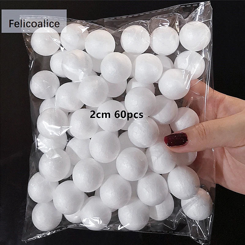 A clear plastic bag filled with white polystyrene foam balls for crafting and decorating.