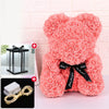 Our fluffy pink rose bear plush toy with a black ribbon and an LED light decoration.