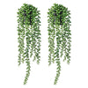 Hanging artificial plant wall decor featuring lush green foliage cascading downwards.