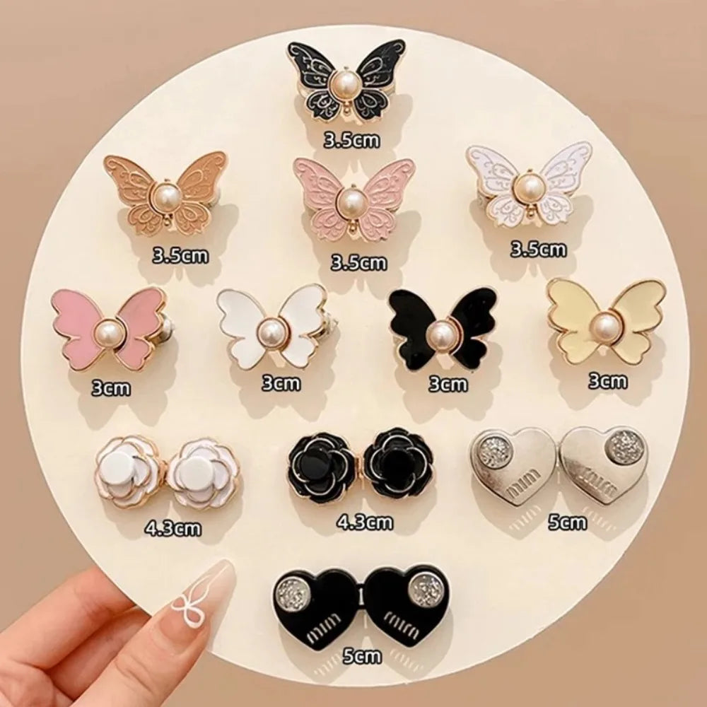 A collection of adjustable butterfly clips in various colors and sizes for clothing