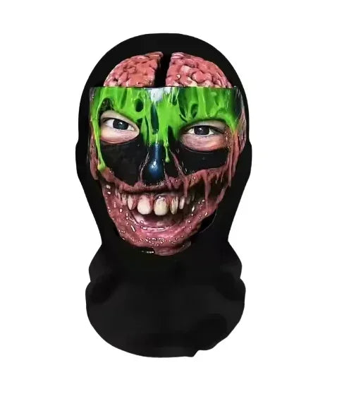 A mask resembling a skull with vibrant green and black paint, used for party or cosplay.