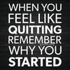 White text on a dark wooden background reads When you feel like quitting remember why you started