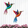 Vibrant metal hummingbird wall art featuring iridescent green, blue, and magenta feathers against a white background.