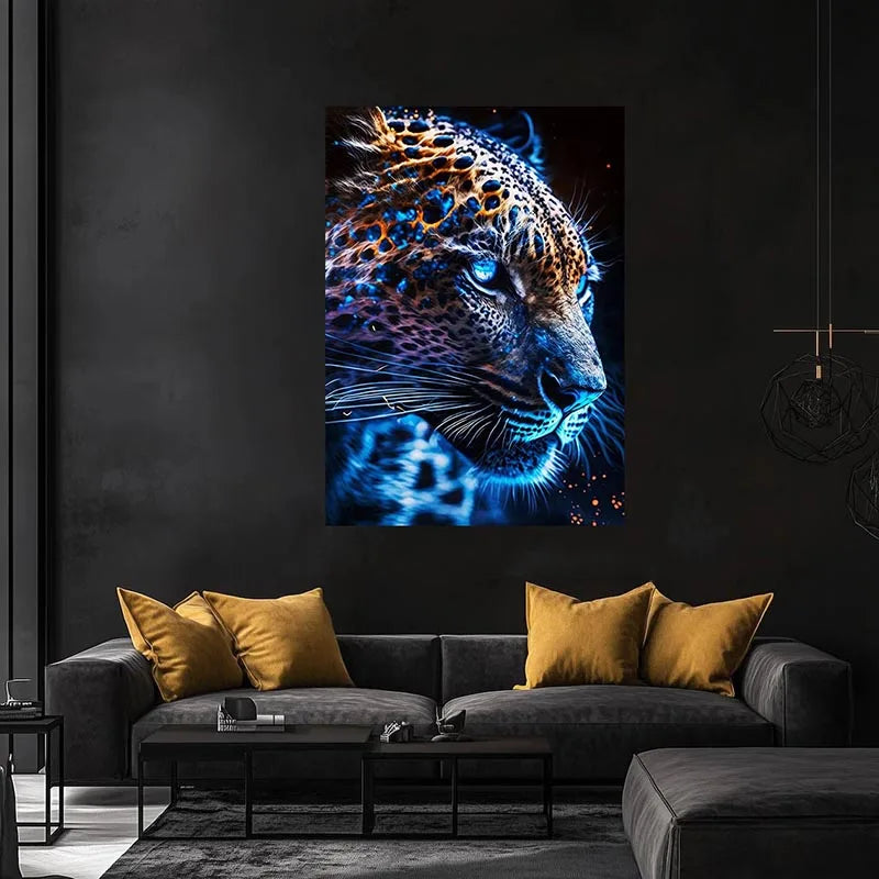 A canvas print of a roaring tiger's face with blue and gold abstract patterns displayed on a dark wall.
