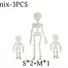 A set of three poseable magnetic skull fridge magnets labeled mix-3PCS