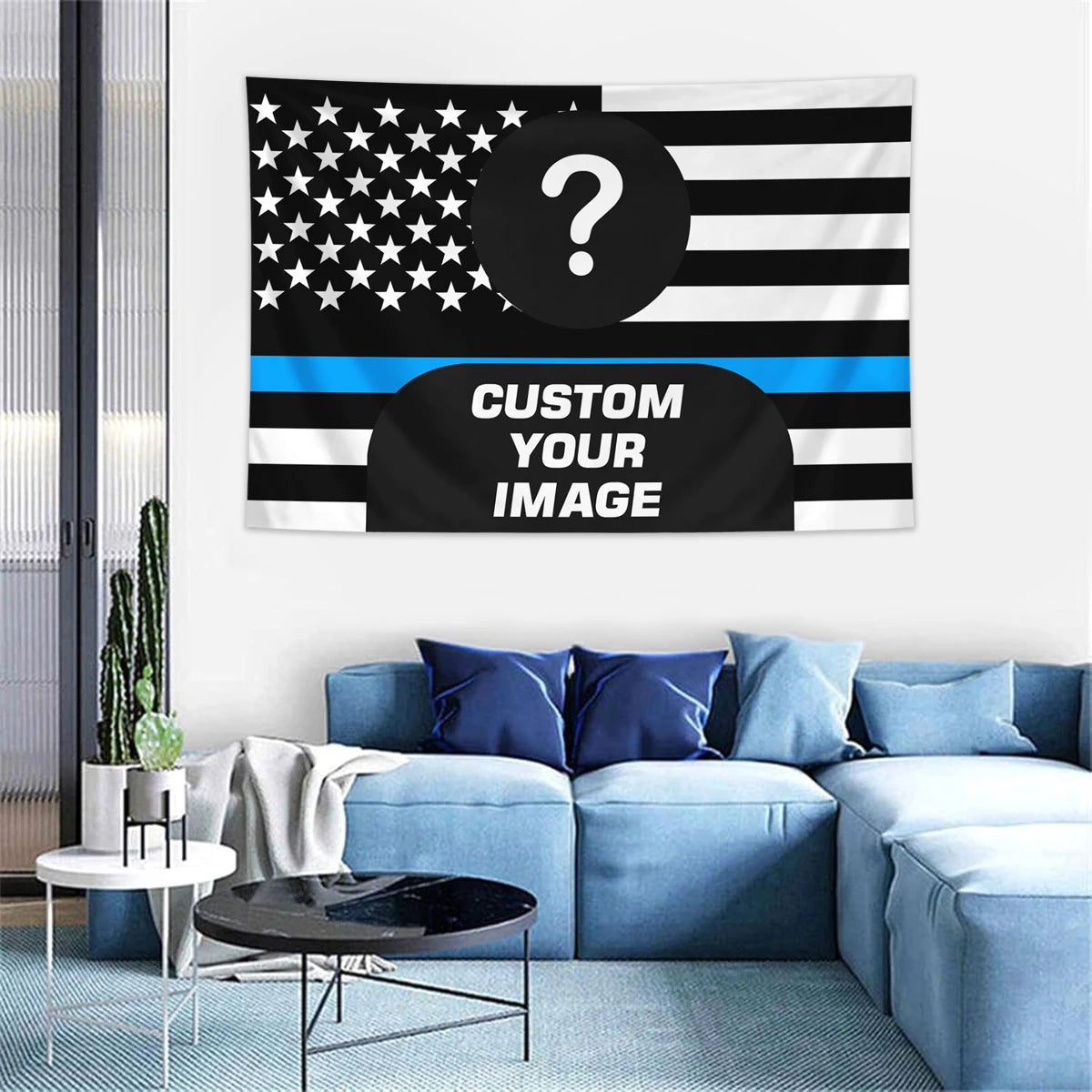A custom photo American flag tapestry displayed on a wall above a blue sofa.