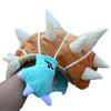 A plush knit cap of Tony Tony Chopper with a light blue body and orange ears and snout.