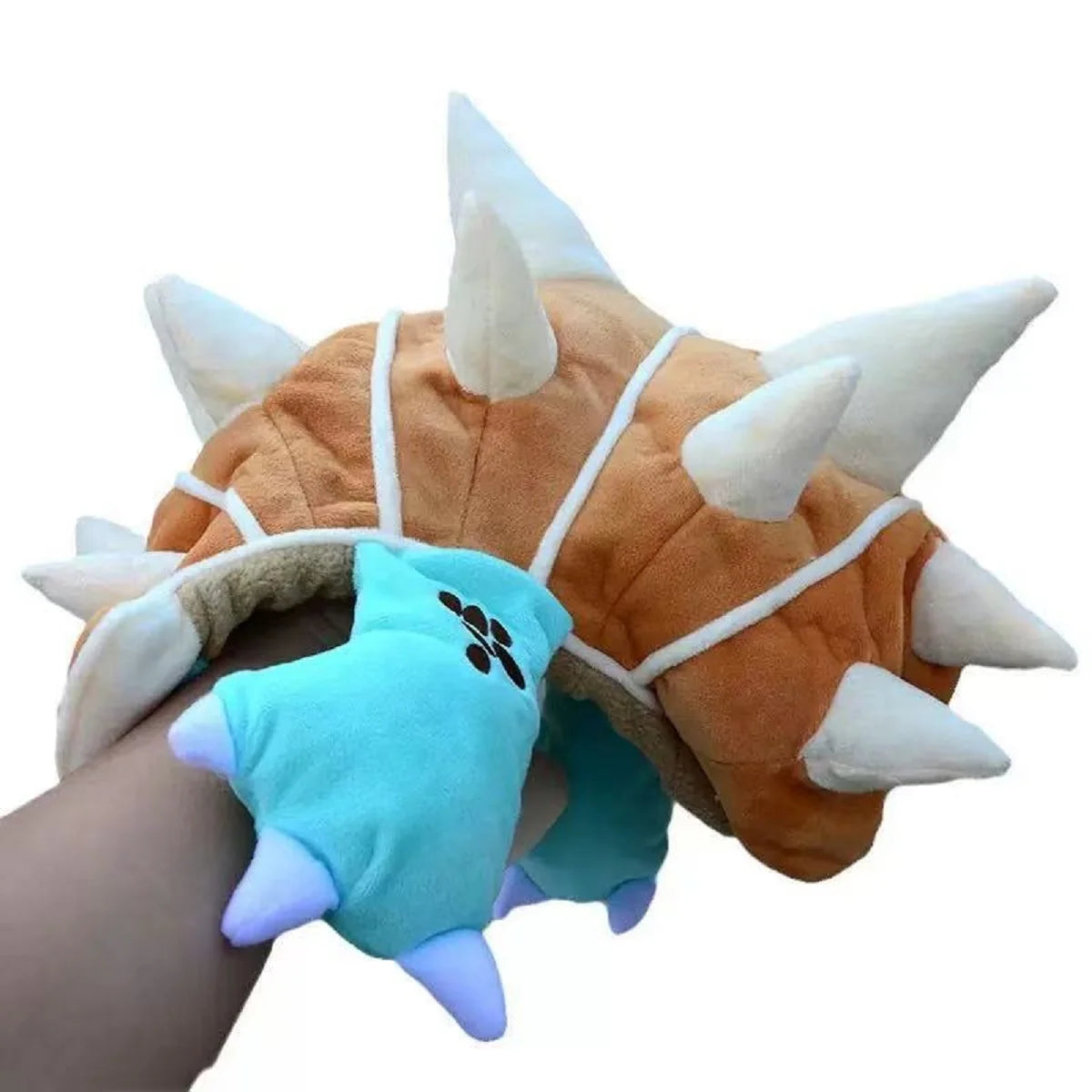 A plush knit cap of Tony Tony Chopper with a light blue body and orange ears and snout.