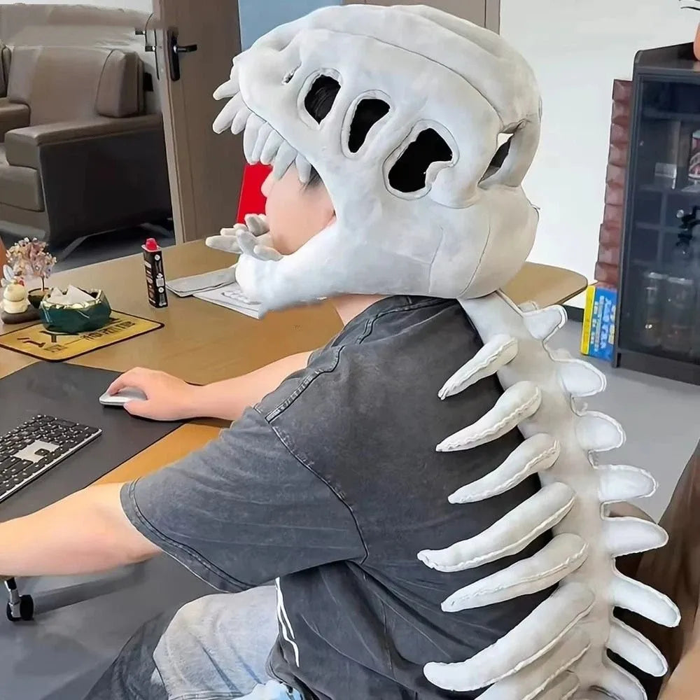 A person wearing a white 3D dinosaur skeleton plush costume for kids, showing the upper torso and head.