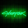 A neon green sign spelling out CYBERPUNK is suspended against a dark grid background.