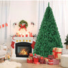 A tall green artificial Christmas tree decorated with lights and ornaments stands in a bright living room setting.