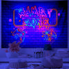 A vibrant neon sign featuring the text GAMET ZONE displayed on a brick wall background.
