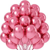 A bouquet of metallic pink balloons used for party decorations.