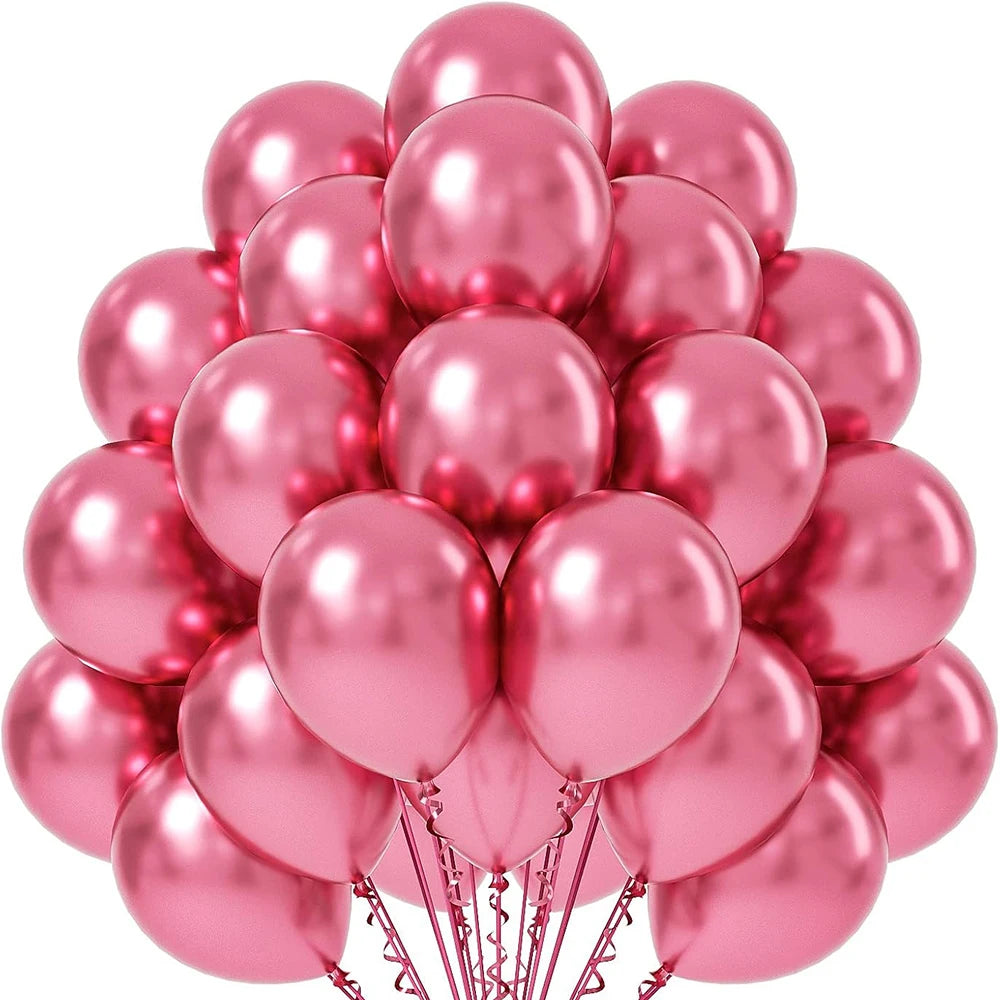 A bouquet of metallic pink balloons used for party decorations.