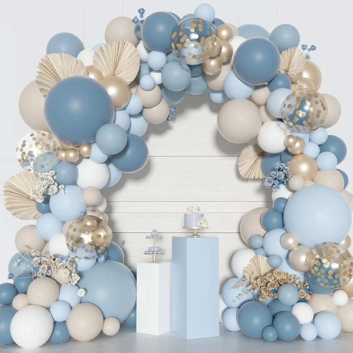 A balloon arch kit featuring dusty blue and sand white balloons with gold confetti accents.