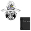 A white and black horror movie icon building blocks set featuring a stylized monster head and a dark notebook.