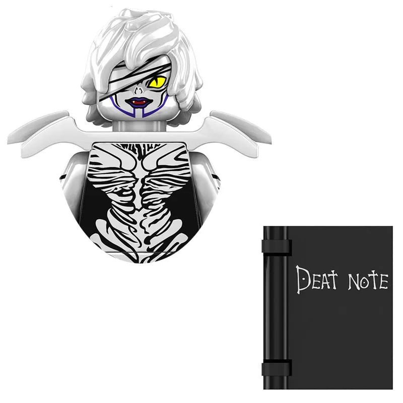 A white and black horror movie icon building blocks set featuring a stylized monster head and a dark notebook.