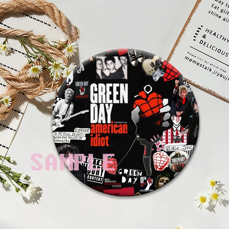 A circular button pin featuring a collage of punk band imagery and text on a black background.