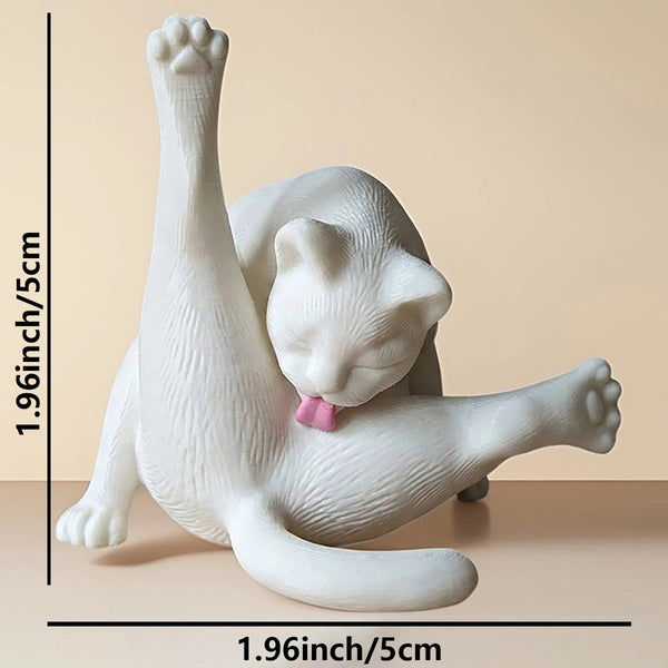 A white 3D printed cat figurine with pink accents shown from the side.