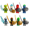 A collection of golden ninja building block figures in various colors and styles.