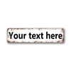 A rectangular vintage tin sign with distressed white paint and black text that reads Your text here.