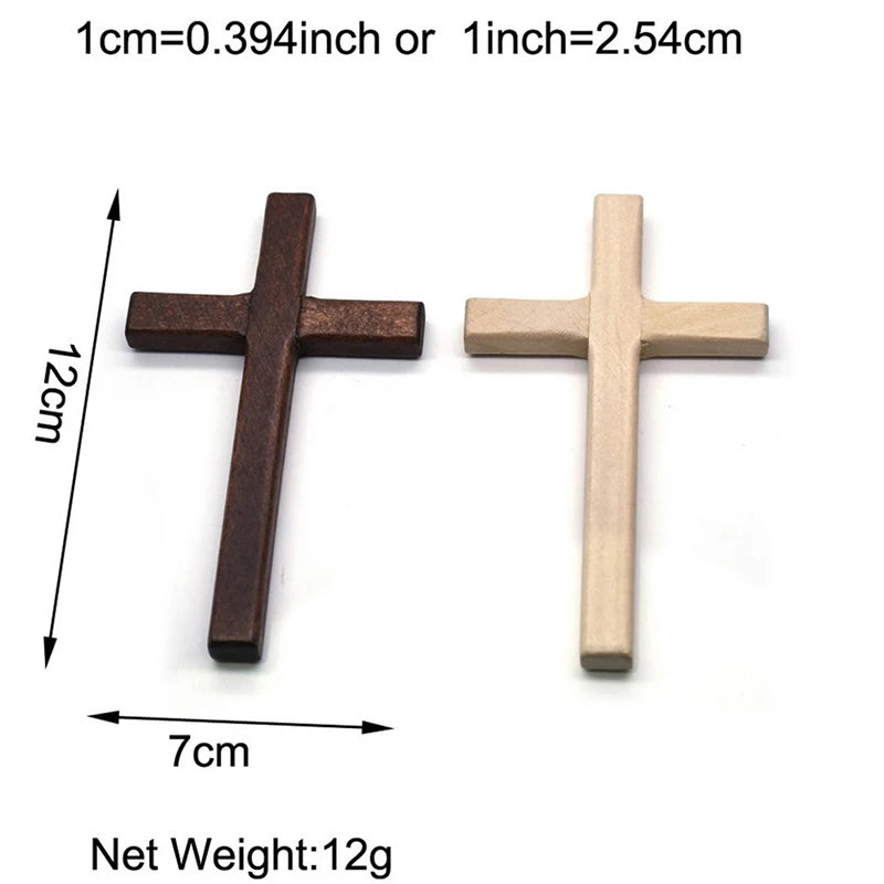 A pair of handcrafted wooden wall crosses, one dark brown and one light wood tone, with a 12cm length.