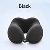 A black U-shaped memory foam neck pillow shown from above.