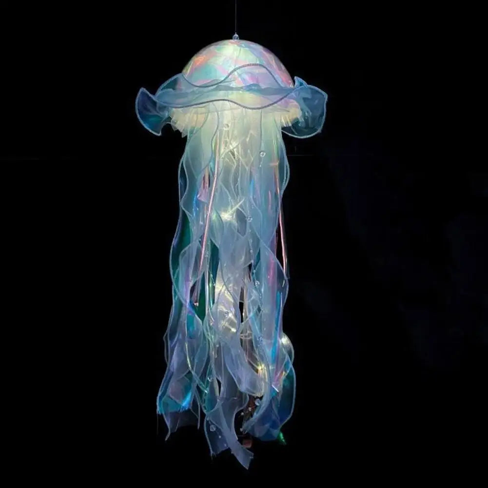 A translucent blue and purple jellyfish lantern hanging against a black background.