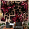 A tapestry wall hanging featuring a leopard print background with large, deep purple floral leaves.