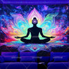 UV reactive chakra lotus tapestry wall hanging featuring a silhouette of a meditating figure surrounded by vibrant cosmic col