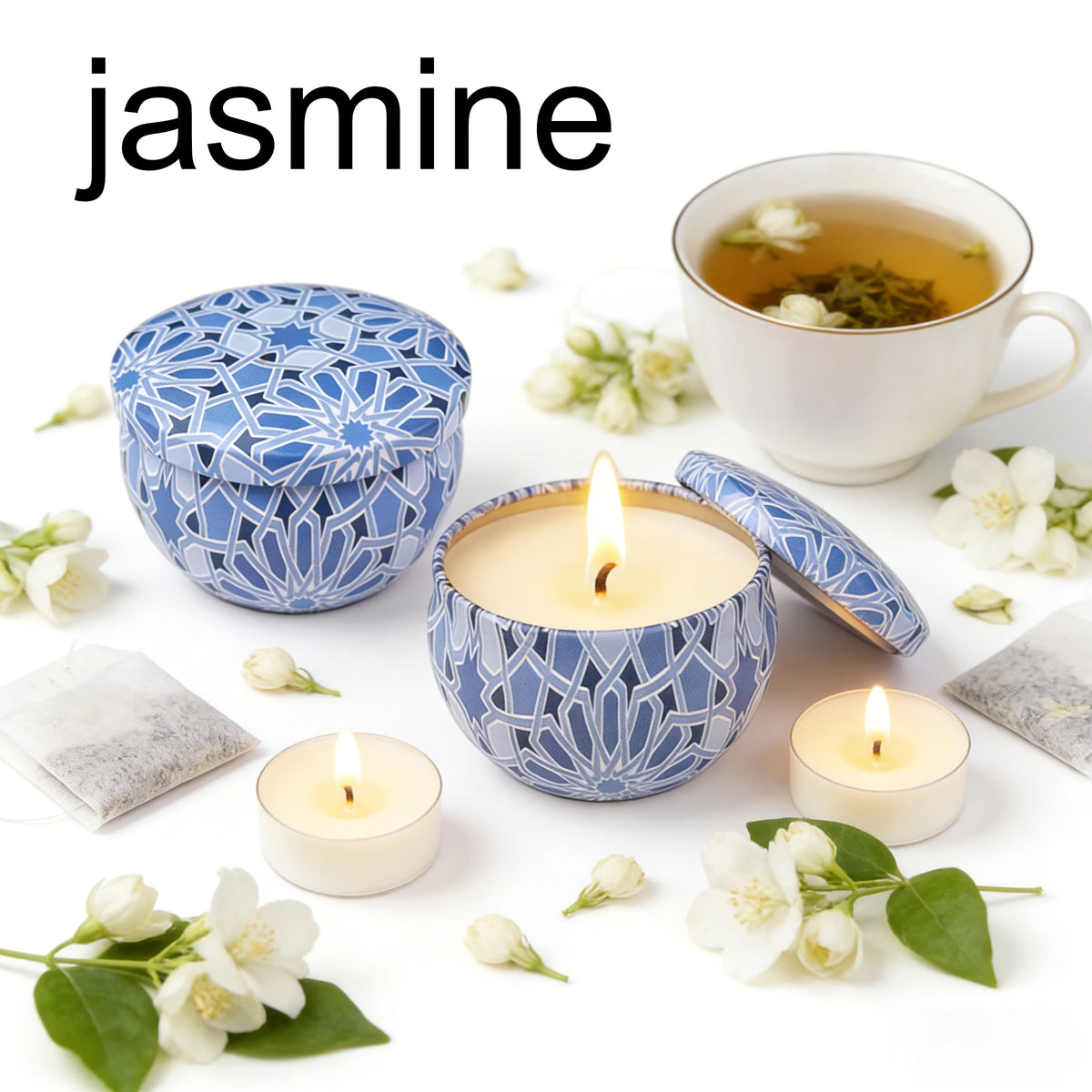 A collection of jasmine-themed soy wax candles, a lit candle in a blue patterned holder, and a glass cup of tea.