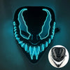A black mask with glowing blue LED lines resembling a stylized face, displayed on a dark surface.