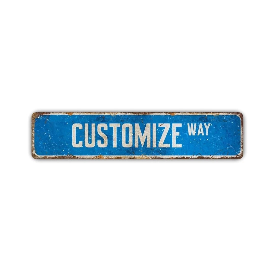 A rectangular blue rustic aluminum street sign with the text CUSTOMIZE WAY.