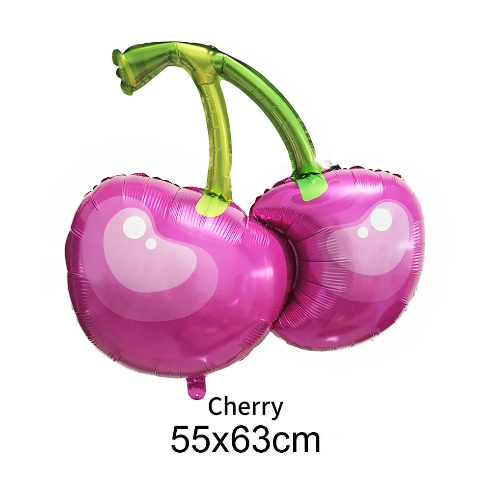 A pink cherry-shaped balloon with a green stem and leaves.