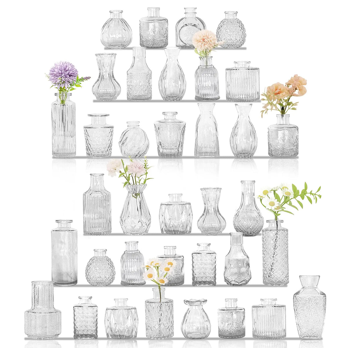 A collection of vintage bud glass vases and bottles arranged in a vertical display.