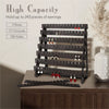 A black multilayer wooden earring organizer with 9 rows, 117 grooves, and 126 holes displaying various jewelry.