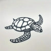 Black metal silhouette of a sea turtle for wall art or coastal beach decor